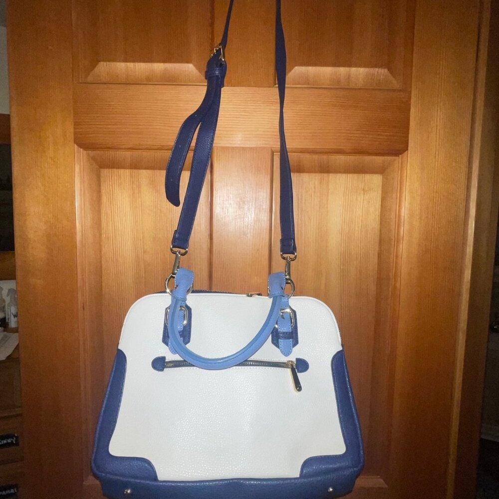 Blue and Cream color handbag.